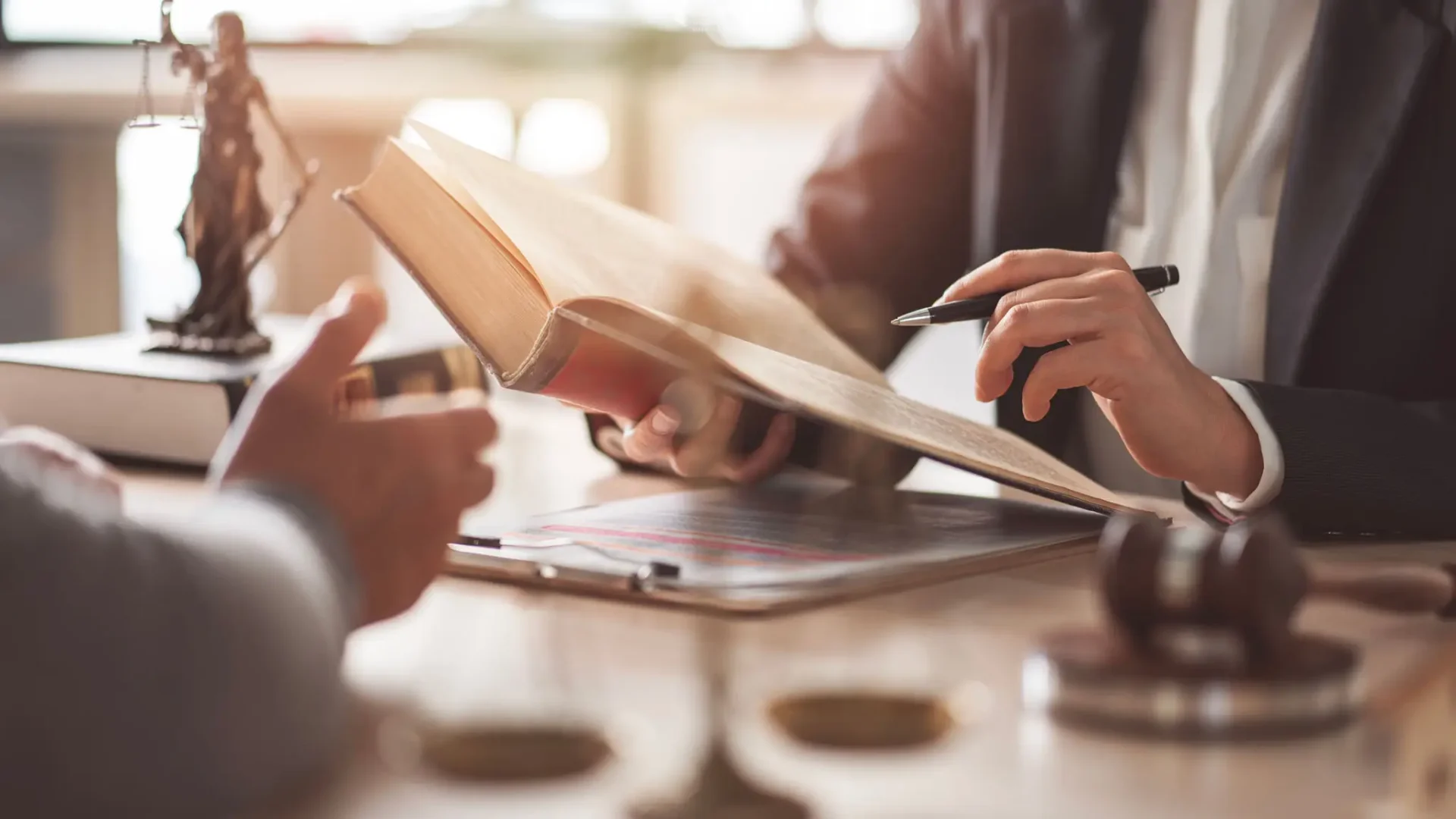 Legal consultation with open law book